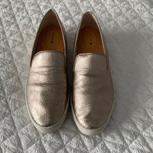 The Swift Birdies, size 9.5 gold slip ons